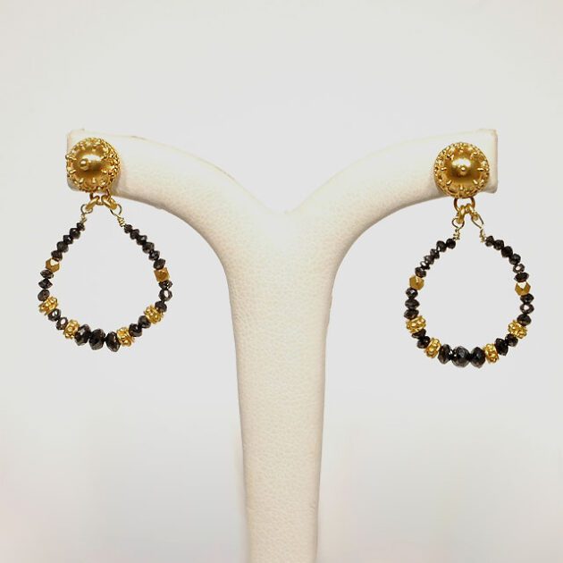 Black diamond earrings set in 22Kt yellow gold.