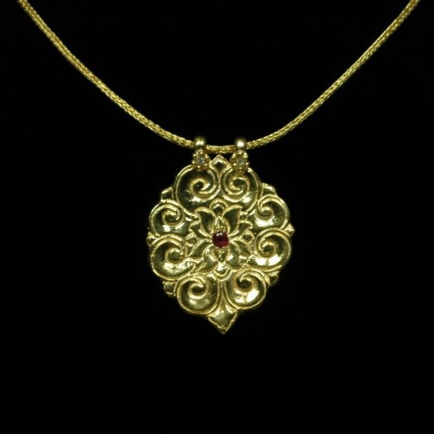 14Kt gold Lotus pendant.