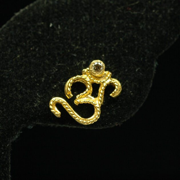 Om earring stud.