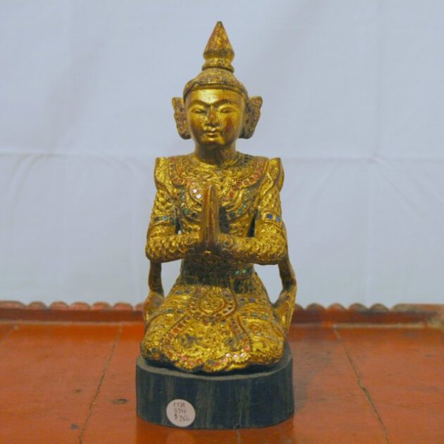 20th century figure of a Burmese angel in the praying pose.