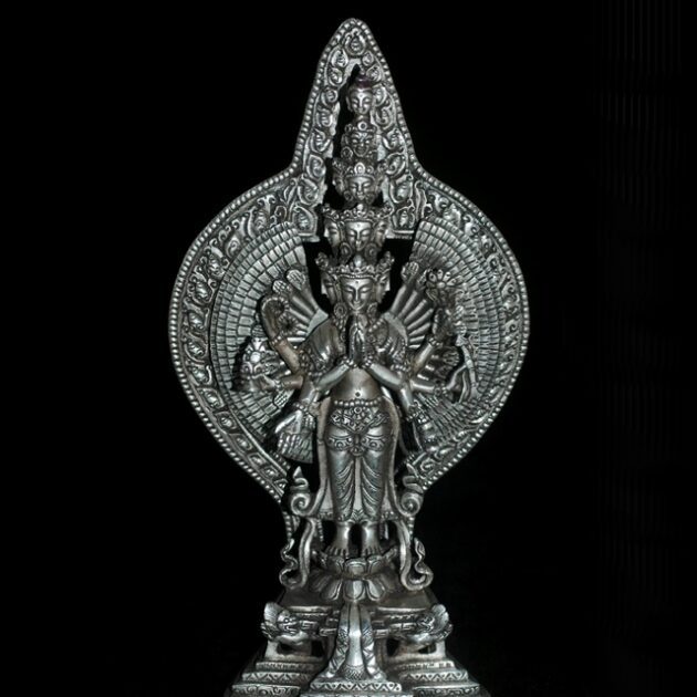 Silver statue of the Buddha of compassion