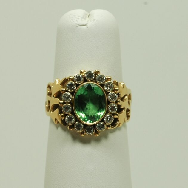 Tsavorite and diamond ring in 18Kt gold.