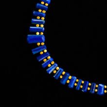 Elegant blue gemstone necklace with 18K gold accents – luxury designer jewelry.