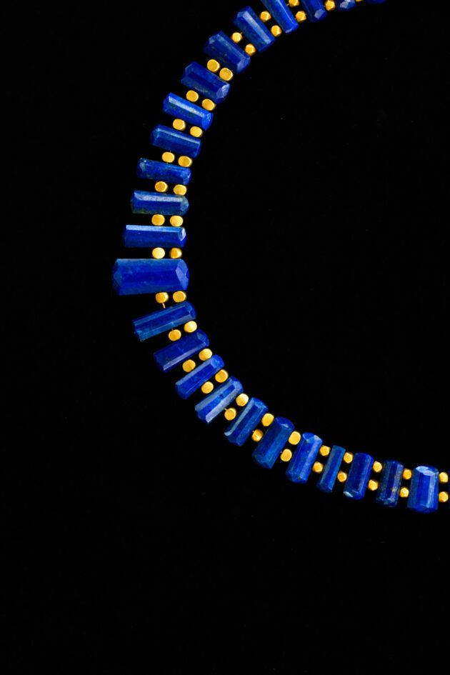 Elegant blue gemstone necklace with 18K gold accents – luxury designer jewelry.