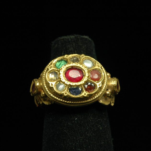 18Kt gold navaratna ring.