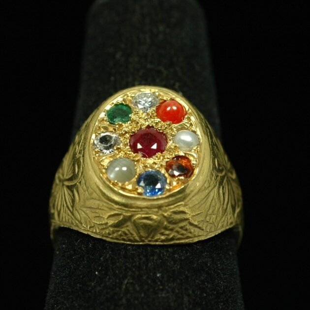 18Kt gold Navaratna ring.