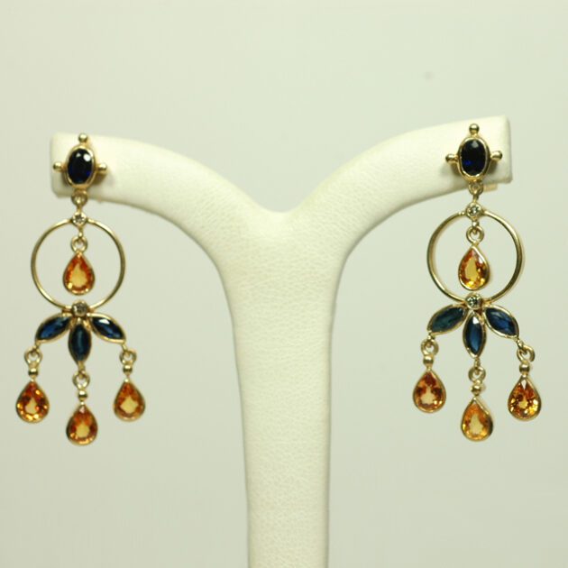Blue and yellow sapphire earrings.