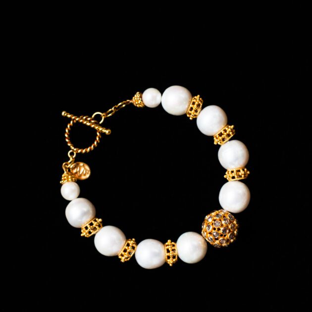 Luxury pearl and diamond bracelet with handcrafted 22K gold beads.