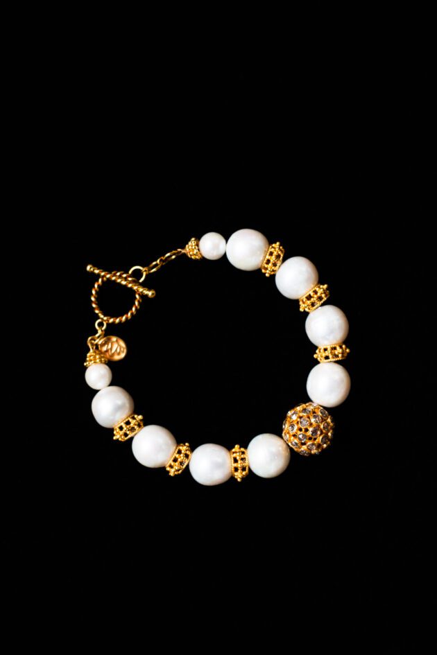 Luxury pearl and diamond bracelet with handcrafted 22K gold beads.