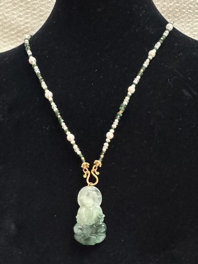Jade Buddha on emerald bead chain